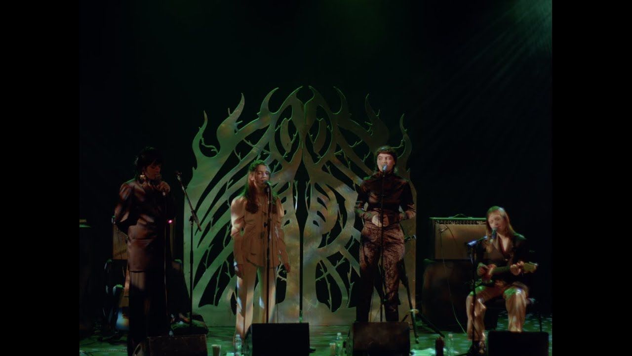 WOOM performing live